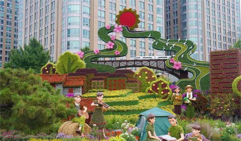 東單東南角的“共同富?！敝黝}花壇.jpg